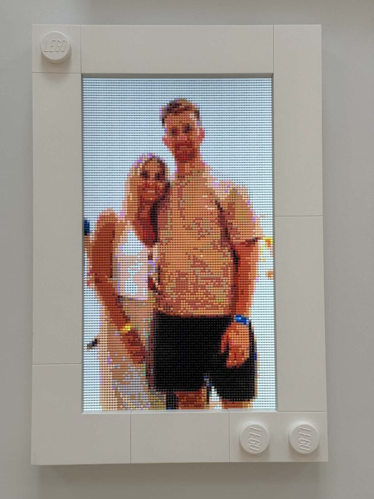 Couple posing for a photo made into Lego format