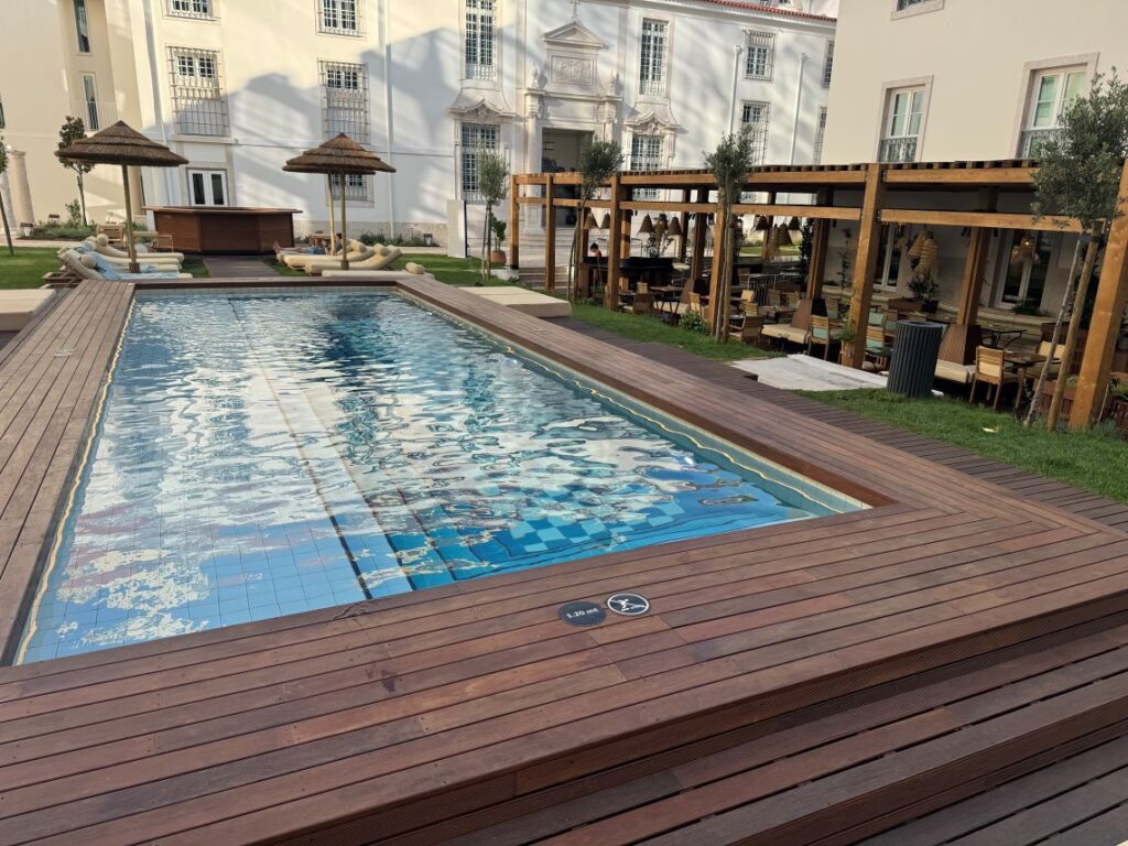 Pool and sunbeds at Locke De Santa Lisbon Hotel