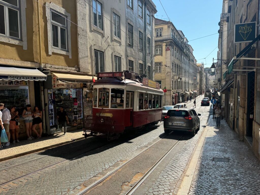 Old red tram on the streets of Lisbon, Portugal